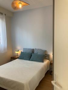 Postel nebo postele na pokoji v ubytování Les Mouettes