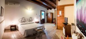 TV a/nebo společenská místnost v ubytování Alba Bed & Breakfast