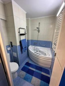 Koupelna v ubytování Apartament de lux, zona centrala