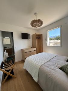 Postel nebo postele na pokoji v ubytování Chambre d'hôtes AU CHAUVET