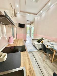 a living room with a couch and a table at Tonik in Tbilisi City