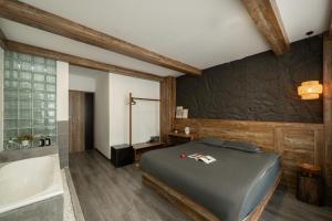 Postel nebo postele na pokoji v ubytování Zeus Living - Harmony Hideout