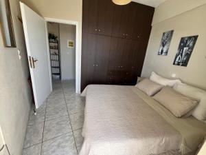 Posteľ alebo postele v izbe v ubytovaní Petasos House - Garden - Sea View