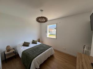 Postel nebo postele na pokoji v ubytování Chambre d'hôtes AU CHAUVET