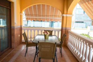 En balkon eller terrasse på Villa Ilusión Home