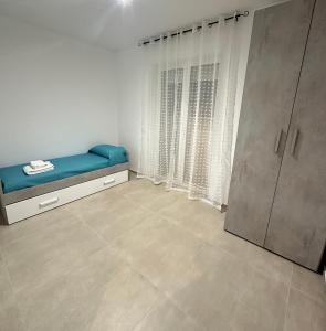 Postel nebo postele na pokoji v ubytování B&b al borgo