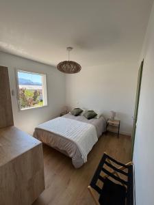 Postel nebo postele na pokoji v ubytování Chambre d'hôtes AU CHAUVET