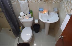 Ένα μπάνιο στο Strandblick in der Residenz Apartment in Santo Domingo