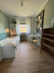 Postel nebo postele na pokoji v ubytování Rintelner Gänse-Quartier + 7 fotografií