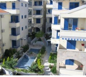 an aerial view of a city with tall buildings at Stan Rafailovici LM in Rafailovici