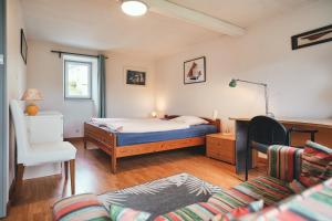 Postel nebo postele na pokoji v ubytování Maison partagée - Moulin de Kerellec