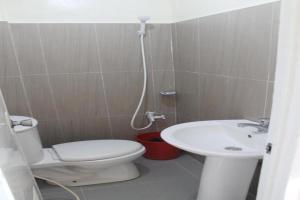 Koupelna v ubytování Super OYO Capital O 2166 Elitya Stay
