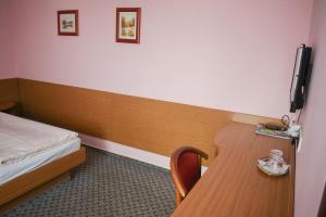 Postel nebo postele na pokoji v ubytování Hotel U Jiřího