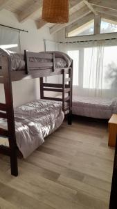 Voodi või voodid majutusasutuse Casa amplia, cómoda y familiar toas