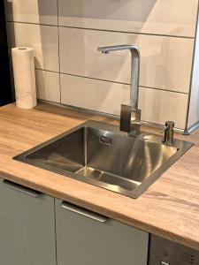 Η κουζίνα ή μικρή κουζίνα στο Deluxe Apartments Franken