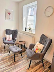 Χώρος καθιστικού στο Deluxe Apartments Franken