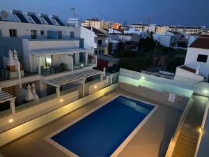 Πισίνα στο ή κοντά στο Villas do Mar O