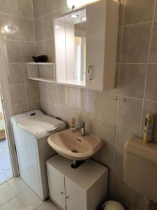 Kúpeľňa v ubytovaní Szeki Apartman