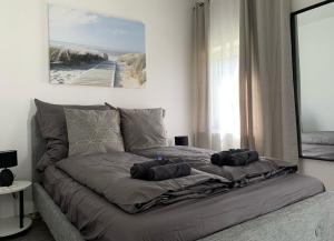 En eller flere senge i et værelse på Ferienwohnung im Harz 4