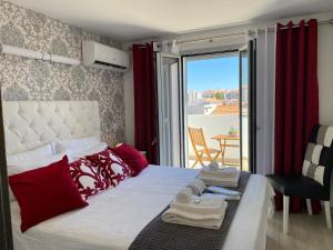 Ένα ή περισσότερα κρεβάτια σε δωμάτιο στο Villas do Mar O +21 φωτογραφίες