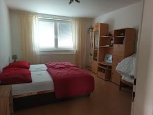 Postel nebo postele na pokoji v ubytování U Cáfi Valtice