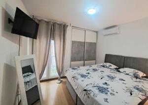 Ein Bett oder Betten in einem Zimmer der Unterkunft Beautiful Apartment, Close to Beach