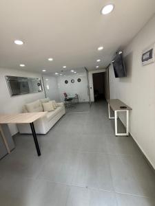 TV a/nebo společenská místnost v ubytování Nova estudio