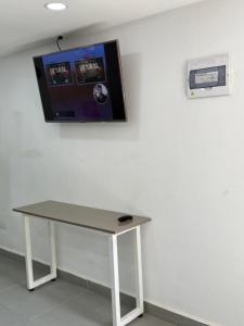 TV a/nebo společenská místnost v ubytování Nova estudio
