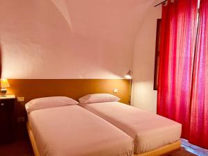 Cama o camas de una habitación en Apartaments Can Gibert