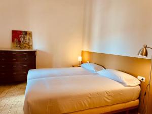 Cama o camas de una habitación en Apartaments Can Gibert