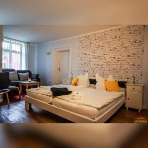 Postel nebo postele na pokoji v ubytování Hotelpension Pfarrhaus