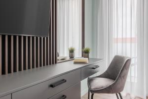 Φωτογραφία από το άλμπουμ του Luxury Grey Apartments - Central, Free Parking, Self Check-In σε Oradea +19 φωτογραφίες