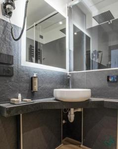 Phòng tắm tại Albergo Cappello e Cadore