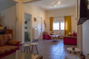Χώρος καθιστικού στο Emilia's Guest House