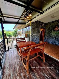 Balkón nebo terasa v ubytování บ้านไร่ปณต 2 BaanraipanoteCottages