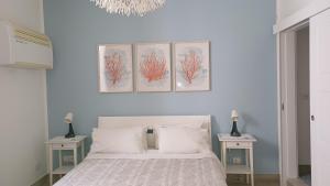 A bed or beds in a room at La Piazzetta
