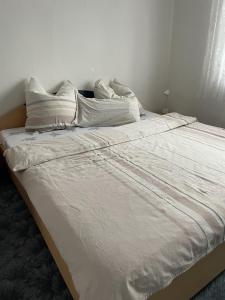 Postel nebo postele na pokoji v ubytování Große Ferienwohnungen in Franken - Familienfreundlich - mit Zuganbindung