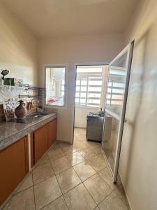 Η κουζίνα ή μικρή κουζίνα στο Residence afoulki 2 hay mohammadi