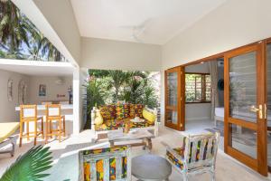 Et opholdsområde på Kasa Tatu Cottages