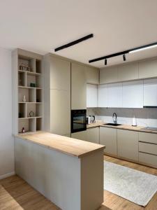 Dapur atau dapur kecil di Modern Apt Near Bus Station