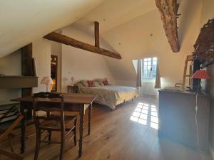 Postel nebo postele na pokoji v ubytování Manoir de La Garaye - Suite Parentale