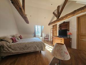 Postel nebo postele na pokoji v ubytování Manoir de La Garaye - Suite Parentale