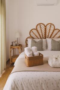 En eller flere senge i et værelse på Cegonha Branca Beach Flat