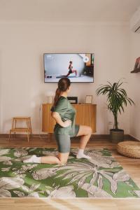 Et tv og/eller underholdning på Cegonha Branca Beach Flat