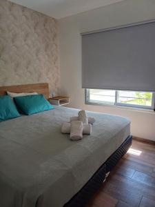 Katil atau katil-katil dalam bilik di Las Huellas Casa de Campo
