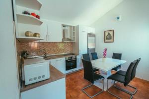 Køkken eller tekøkken på Villa Relax - apartman