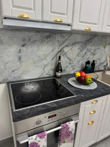 O bucătărie sau chicinetă la Dady's Apartament