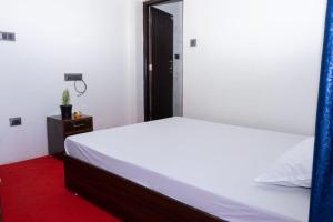 Postel nebo postele na pokoji v ubytování Basosthaan homestay