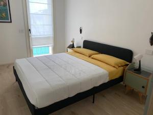 Postel nebo postele na pokoji v ubytování Maison Thiago