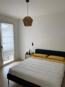 Postel nebo postele na pokoji v ubytování Maison Thiago